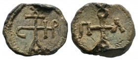 Byzantine lead seal of Paul stratelates
(6th/7th cent.)

Obverse: Cruciform monogram: ΠΑΥΛΟΥ= Παύλου (Of Paul), all within wreath border.

Reverse: Cr...
