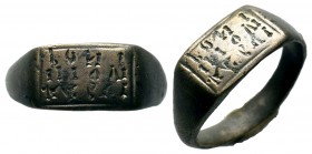 Byzantine/Crusader, c. 9th-13th century AD. Beautiful Bronze Seal Ring with an inscription on Bezel,

Weight: 4,15 gr
Diameter: 19,50 mm