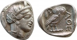 ATTICA. Athens. Tetradrachm (Circa 454-404 BC).
Obv: Helmeted head of Athena right, with frontal eye.
Rev: AΘE.
Owl standing right, head facing; olive...