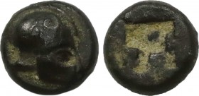 IONIA. Uncertain. Tetartemorion (5th century). Obv: Helmet right. Rev: Star of four rays, with pellet at center; all within incuse square. Leu E-1, lo...