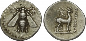 IONIA. Ephesos. Drachm (2nd century BC). Pyrralion, magistrate..
Obv: Ε - Φ.
Bee.
Rev: ΠYΡΡΑΛΙΩΝ.
Stag standing right; palm tree behind.
cf. BMC 121 f...
