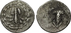 LYDIA. Tralleis. Cistophoric Drachm (Circa 166-67 BC). Obv: Lion skin draped over club; all within ivy wreath. Rev: TPAΛ. Grape bunch on vine. Control...