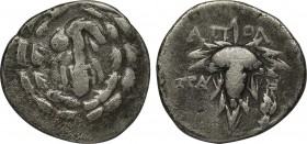 LYDIA. Tralleis. Cistaphoric Didrachm (Circa 166-67 BC).
Obv: Club draped with lion skin; all within wreath.
Rev: Grape bunch within leaves. Controls:...