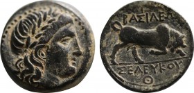SELEUKID EMPIRE. Seleukos I (312-281 BC). Ae (280s BC). Seleucia II.
Obv: Laureate head of Apollo right.
Rev: BAΣΙΛΕΩΣ ΣEΛEYKOY.
Bull butting right; K...