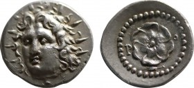 CARIA. Rhodes. Drachm (Circa 88/42 BC-AD 14).
Obv: Radiate head of Helios facing slightly left.
Rev: P - O.
Rose seen from above. Control: below, g...