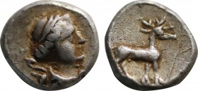 IONIA, Ephesos. (Circa 245-202 BC). AR Obol. Obv:Draped bust of Artemis right; bow and quiver over shoulder. Rev:Stag standing right. Extremely Rare. ...