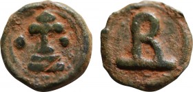 BASIL I THE MACEDONIAN (867-886). Ae. Cherson.
Obv: Large B set upon exergue line; pellet on each side.
Rev: Patriarchal cross set upon three steps; p...