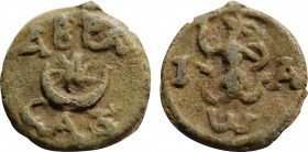 ASIA MINOR. Uncertain. PB Tessera (Circa 3rd-4th centuries).
Obv: IAω.
Anguipede (Iao Abraxas) right, holding whip and shield.
Rev: ABPA / CAΞ.
Star w...