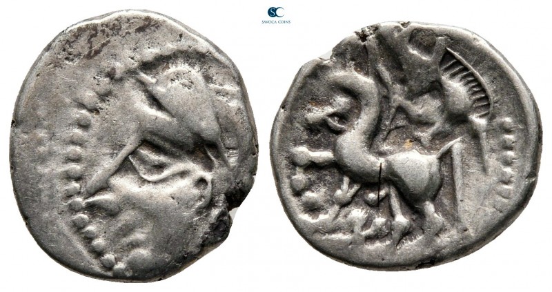 Central Gaul. Bituriges Cubi and Lemovices circa 70-50 BC. Quinarius AR

15 mm...