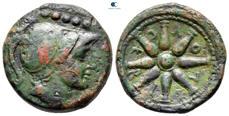 Apulia. Luceria circa 211-200 BC. 
Quincunx Æ

23 mm, 9,81 g

Helmeted head...