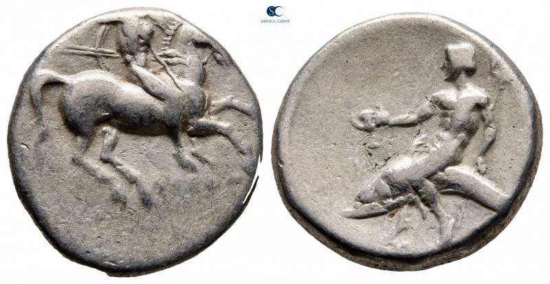 Calabria. Tarentum circa 280-272 BC. 
Stater AR

20 mm, 6,28 g

Nude, helme...