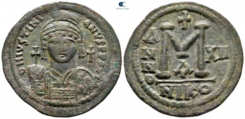 Justinian I AD 527-565. Dated RY 12=AD 538/9. Nikomedia
Follis or 40 Nummi Æ
...