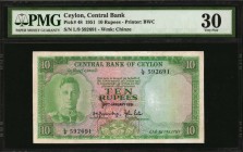 CEYLON. Central Bank. 10 Rupees, 1951. P-48. PMG Very Fine 30.
Printed by BWC. Watermark of Chinze. King George VI at left. PMG comments "Ink Stamps....