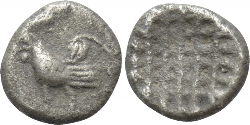 TROAS. Dardanos. Obol (450-420 BC). 

Obv: Cock standing left.
Rev: Diagonall...
