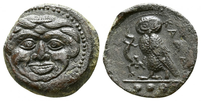 Sicily. Kamarina circa 420-405 BC.
Tetras Æ

14mm., 3,22g.

Gorgoneion / Ow...