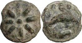 Greek Italy. Northern Apulia, Luceria. Light series. AE Cast Teruncius, c. 217-212 BC. Star of eight rays on a raised disk. / Dolphin right; above, th...