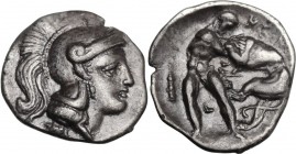 Greek Italy. Southern Apulia, Tarentum. AR Diobol, c. 302-228 BC. Head of Athena right, wearing crested Attic helmet. / Traces of ethnic. Herakles wre...