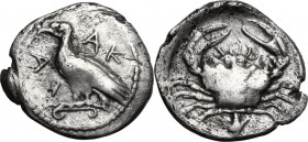 Sicily. Akragas. AR Litra, c. 450-439 BC. AK-R (retrograde) A. Eagle standing left on Ionic capital. / Crab; floral symbol below. SNG ANS 986-8; Lee p...