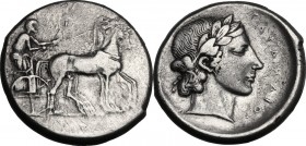Sicily. Katane. AR Tetradrachm, c. 435-412 BC. Charioteer, wearing long chiton, holding kentron and reins, driving slow quadriga right. / Head of Apol...