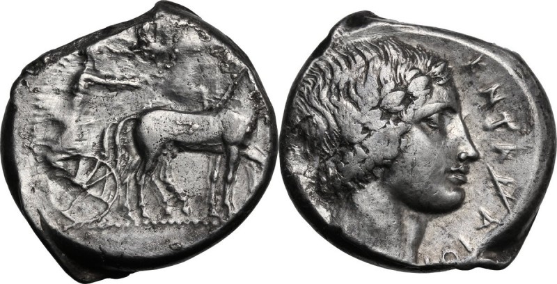 Sicily. Katane. AR Tetradrachm, c. 425 BC. Slow quadriga right, horses crowned b...