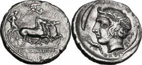 Sicily. Katane. AR Drachm, c. 405-404 BC. Signed by the artist Choirion. Female charioteer, holding kentron and reins, driving fast quadriga right; ab...