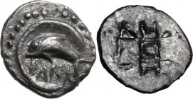 Sicily. Messana as Zankle. AR Obol, c. 500-493. DANK. Dolphin left, within crescent-shaped harbour. Dotted border. / Cockle shell in patterned incuse ...