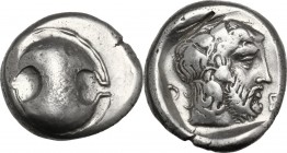 Continental Greece. Boeotia, Thebes. AR Stater, c. 425-395 BC. Boeotian shield. / Bearded head of Dionysos right, wearing ivy wreath; Θ-E across field...