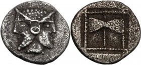 Greek Asia. Islands off Troas, Tenedos. AR Obol, early-mid 5th century BC. Janiform head, male on left, female on right. / Labrys (double axe) in dott...