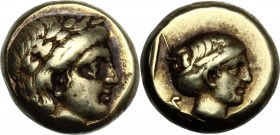 Greek Asia. Lesbos, Mytilene. EL Hekte, c. 377-326 BC. Laureate head of Apollo right. / Head of female right, with hair in sakkos; to left, serpent co...