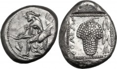 Greek Asia. Cilicia, Soloi. AR Stater, c. 440-410 BC. Amazon kneeling left, quiver and bowcase at her side, holding bow; ivy leaves to left, helmet to...