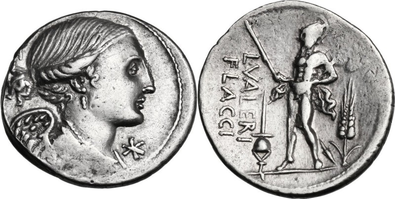 L. Valerius Flaccus. AR Denarius, 108-107 BC. Draped bust of Victory right; belo...