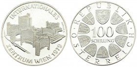 Austria 100 Schilling 1979 Averse: Value within circle of shields. Reverse: Vienna International center; date bottom right. Edge Description: Lettered...