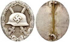 Germany WWII Silver Wound Badge (1939) early war Model 1939. Wound Badge in Silver Grade; central depiction of a steel helmet with a swastika on cross...
