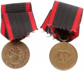 Poland Medal 1930 of Independence 1918-1939. Three hydras pierced with three swords; below on the left a mark of the manufacturer of GW; in the rim th...