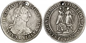 1783. Carlos III. Premio a la fidelidad. Medalla. (Medina Col. 14) (MHE. 377, mismo ejemplar). 13,45 g. Ø35 mm. Plata. Perforación. Rarísima. MBC-.