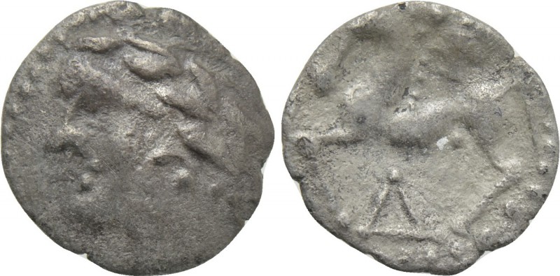 CENTRAL EUROPE. Boii? Obol (2nd-1st centuries BC). 

Obv: Stylized laureate he...