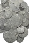 29 modern coins, mostly holed.
