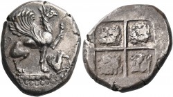 IONIA. Teos. Circa 540-478 BC. Stater (Silver, 24 mm, 11.67 g). Griffin, with open mouth, seated to right on ornamental pedestal, his left forepaw rai...