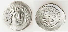 CARIAN ISLANDS. Rhodes. Ca. 84-30 BC. AR drachm (21mm, 4.03 gm, 4h). XF, bent, light scuffs. Euphranor, magistrate. Radiate head of Helios facing, tur...