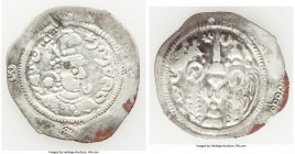 WESTERN TURKS. 'Phromo Kesaro'. Ca. late AD 7th century. AR drachm (33mm, 3.64 gm, 3h). VF. Imitating Hormizd IV Drachm of Balkh mint Year 11, (cf. Su...