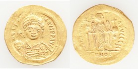 Justinian I the Great (AD 527-565). AV solidus (22mm, 4.41 gm, 6h). Choice VF, wavy flan, graffiti. Constantinople, 8th officina, ca. AD 545-565. D N ...