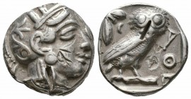 ATTICA.Athens.Circa 454-404 BC.AR Tetradrachm

Obverse : Helmeted head of Athena right
Reverse : AΘE; owl standing right, head facing; olive sprig and...
