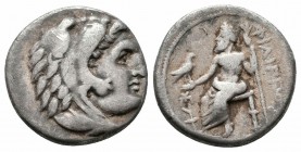 KINGS of MACEDON.Alexander III.336-323 BC.Sardes Mint.AR Drachm

Obverse : Head of Herakles right, wearing lion skin headdress
Reverse : ΦIΛIΠΠOY; Zeu...