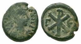 JUSTIN I.518-527 AD.Constantinople mint.AE Pentanummium 

Obverse : DN IVSTINVS PP AVG; Diademed, draped, and cuirassed bust right
Reverse : Large Chr...
