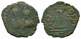 JUSTIN I and JUSTINIAN I.527 AD.Antioch Mint. AE Decanummium

Obverse : DN DN IVSTINVS ET IVSTINIANVS P P AVG; crowned and draped facing busts of Just...