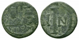 JUSTIN II with SOPHIA.565-578 AD.Carthage Mint.AE Decanummium 

Obverse : DN IVSTINO ET SOFIA AG; Facing busts of Justin, on left, helmeted, and Sophi...
