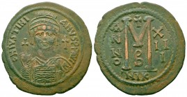JUSTINIAN I.527-565 AD.Nicomedia Mint.AE Follis

Obverse : D N IVSTINIANVS P P AVG; Helmeted and cuirassed bust facing, holding globus cruciger and ...