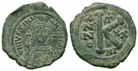 JUSTINIAN I.527-565 AD.Nicomedia Mint.AE Half Follis

Obverse : D N IVSTINIANVS P P AVG; Helmeted and cuirassed bust facing, holding globus cruciger...