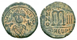 TIBERIUS II CONSTANTINE.578-582 AD.Antioch Mint.AE Follis

Obverse : Crowned facing bust, wearing consular robe, holding mappa and eagle-tipped sceptr...