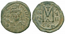 MAURICE TIBERIUS.582-602 AD.Constantinople Mint.AE Follis

Obverse : DN MAVRIC TIBER PP AVG; Helmeted and cuirassed bust facing, holding globus crucig...